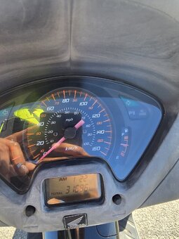 Honda FES Pantheon 150 - 6