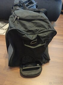Cestovná taška s kolieskami a rukoväťou - 6
