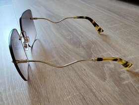 Slnečné okuliare Miu Miu. - 6