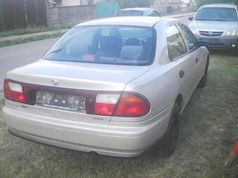 Mazda 323 1,5 benzin 65 KW - 6