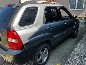 Sportage 2,0i ,4x4 - 6