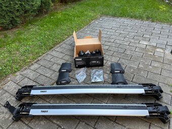 Strešný box Neumann Adventure 205 a Thule nosič - 6
