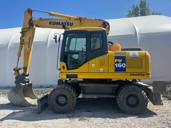 Otočný bager Komatschu PW160 - 6