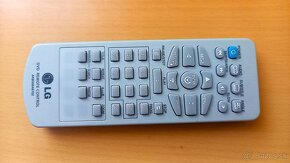 Predám nabíjačku batérií a diaľkové LG - 6