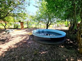 Slnečná záhrada s chatou vo vyhľadávanej lokalite Nová Osada - 6