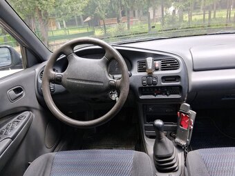 Mazda 323 - 6