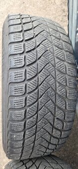 Predám zimný komplet na audi. - 6