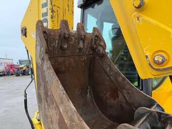 NEW HOLLAND traktor báger 2006 VIN 028 - 6