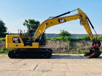 Pásový bager Caterpillar 323 - 6