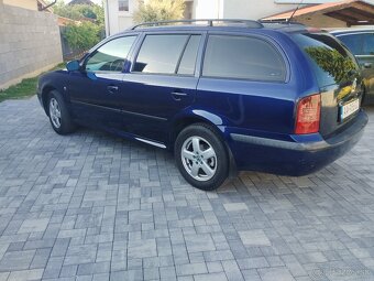 Škoda Octavia combi 1. 1.9tdi 81kw - 6