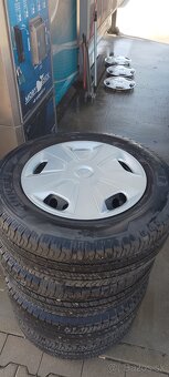 Disky kompletne + letné obutie + puklice original Ford. - 6
