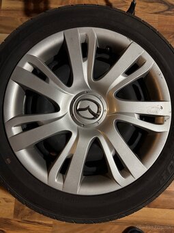 Mazda letne pneumatiky s diskami a puklicami - 6