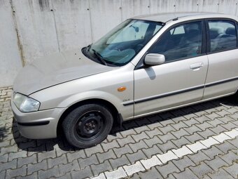 Mazda 323f-bj - 6