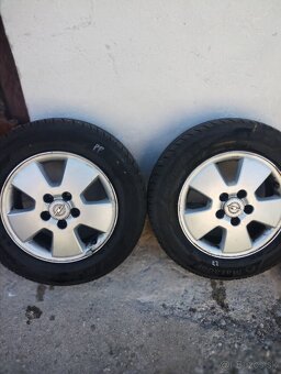 Pneumatiky a disky Opel Astra 2004 - 6