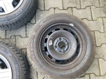 Predám sadu zimných kolies s puklicami na Ford Fiesta R14 - 6
