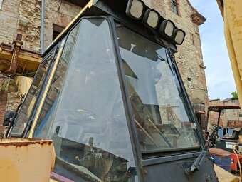 CATERPILLAR 428B 4X4 - 6