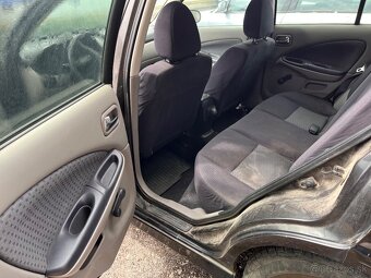 predam Nissan Almera - 6