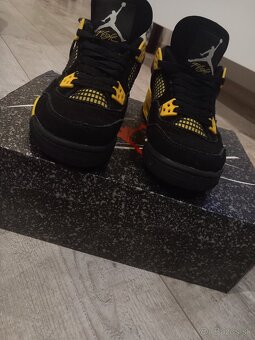 Jordan 4 Retro "Thunder" - 6