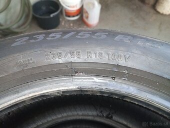 235/55R18 - 6