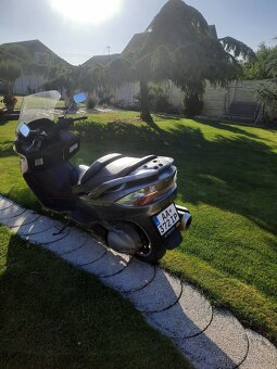 Suzuki Burgman. - 6