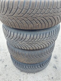 Predám zimnú sadu plecháčov 5x112 r15 Continental - 6