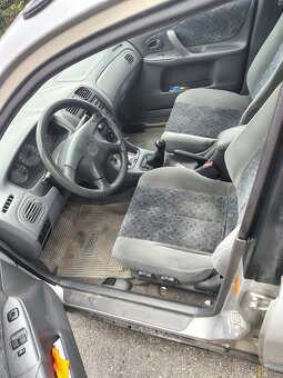 Mazda 323BJ 1.3 - 6