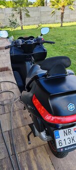 Piaggio x evo 125 - 6