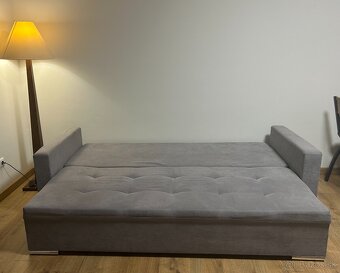 Rozkladací gauč s úložným priestorom + taburetka - 6