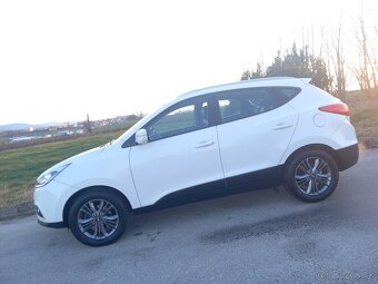Hyundai Tucson ix35 ,1.6 benzin - 6