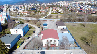 Na predaj priemyselný areál s admin. budovou a garážami v Ro - 6