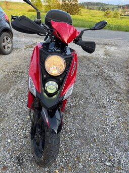 Sym CROX 125 - 6