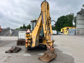 KOMATSU WB975 4X4 - 6