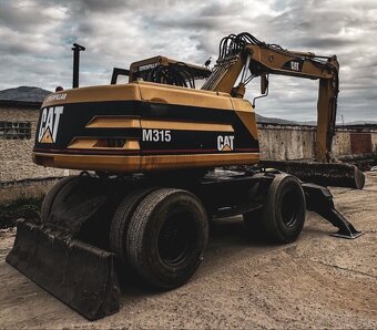 Bager CAT M315 - 6