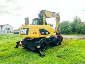 Kolesové rypadlo Caterpillar M315D - 6