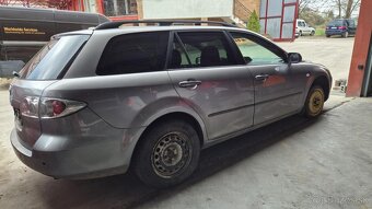 Mazda 6 2,0D 100kw kód motora: RF - 6