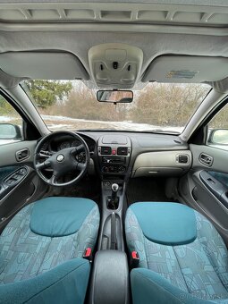 Nissan almera n16 hatchback - 6