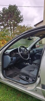 Nissan Almera N16 2005 benzin - 6