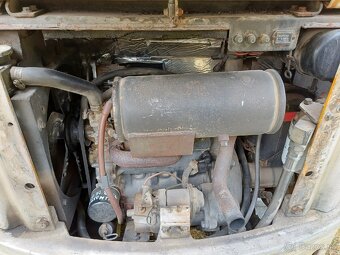 Minibager Bobcat 320 - 6
