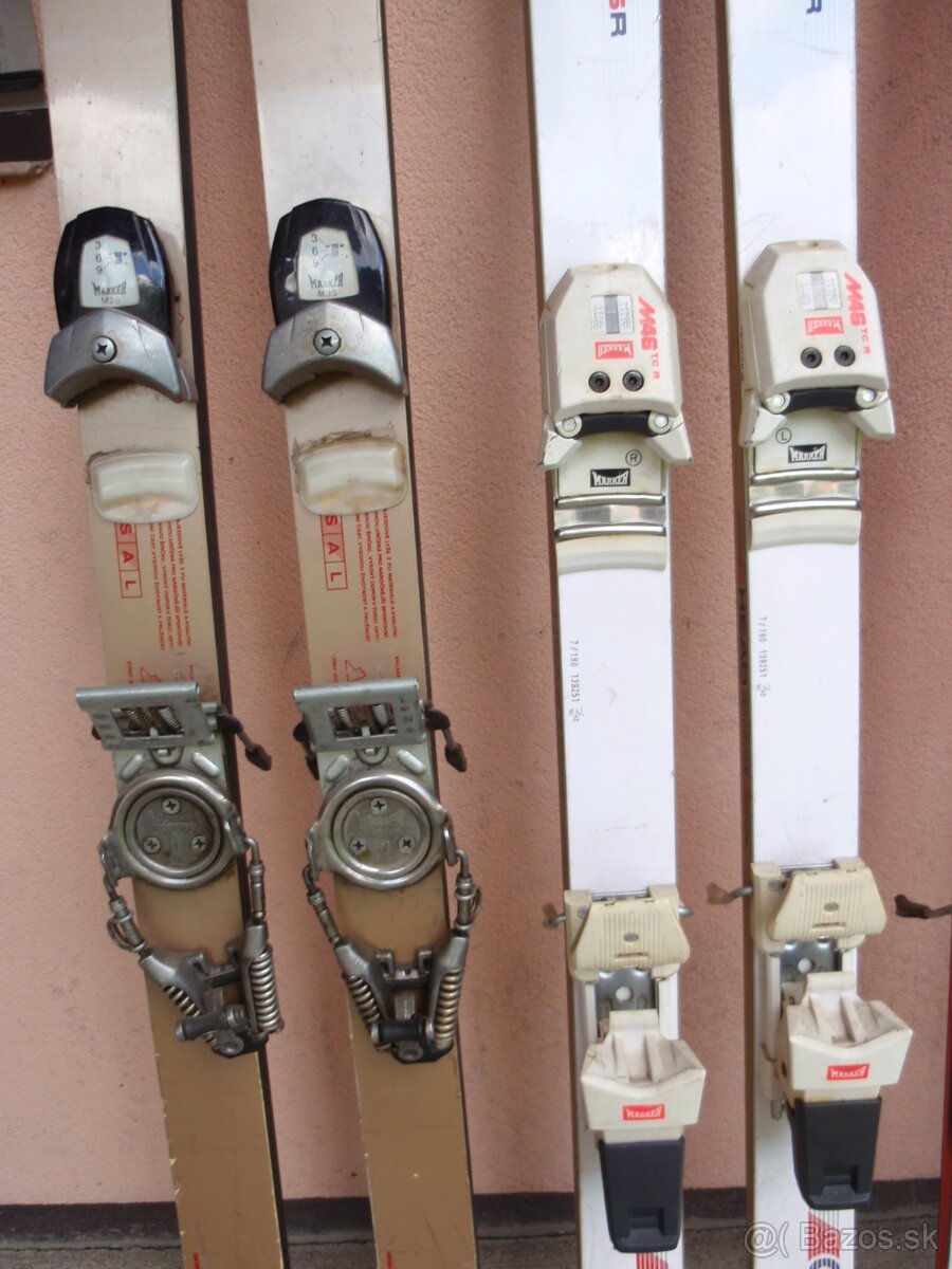 Lyžařská výbava - 9 párů lyží, hůlky, boty - 7