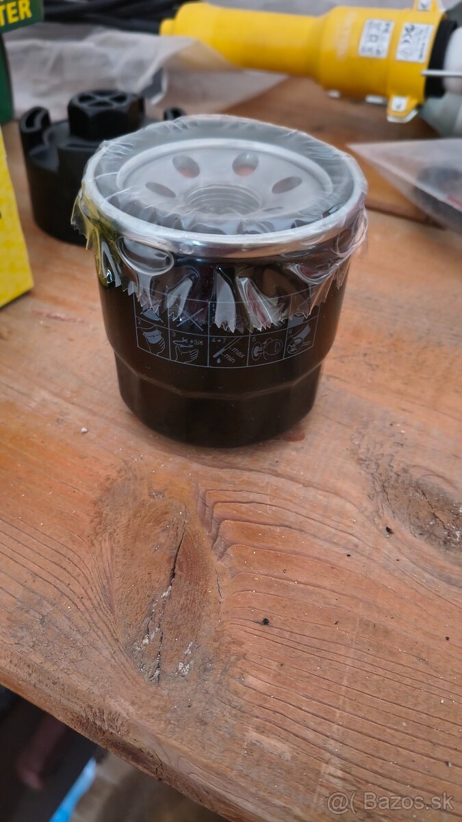 Olejový filter MANN W 7023 + povoľovací kľúč - 7