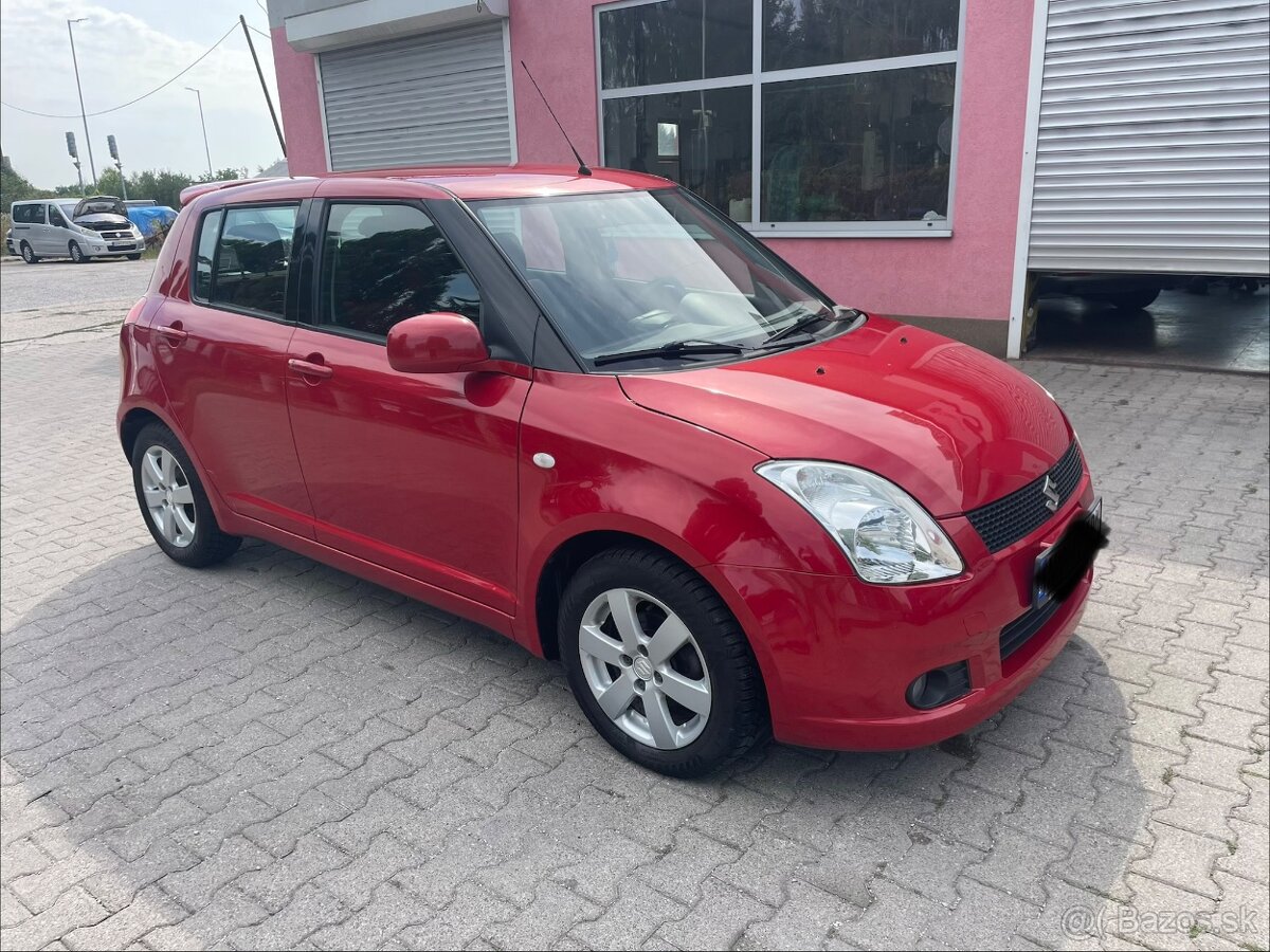 Swift .. 1.4 benzin - 7