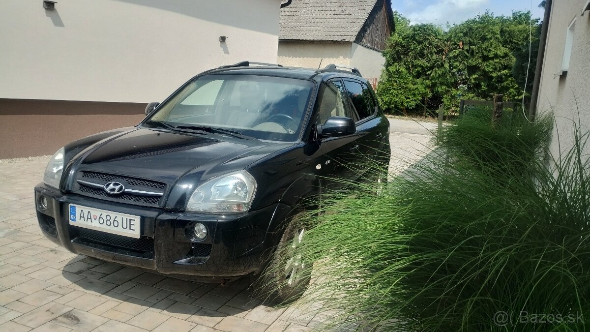Hyundai Tucson 2.0 104kw benzín 4x4 - 7