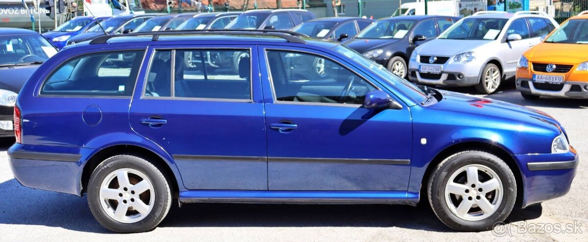 Škoda Octavia Combi 1.6i TOUR - 7