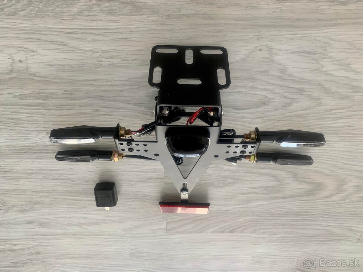 Držiak ŠPZ so smerovkami - 7