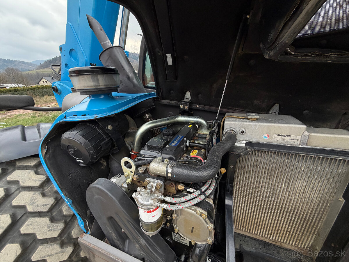Teleskopický manipulátor Manitou MT932 (dosah 9 m). Nosnosť - 7