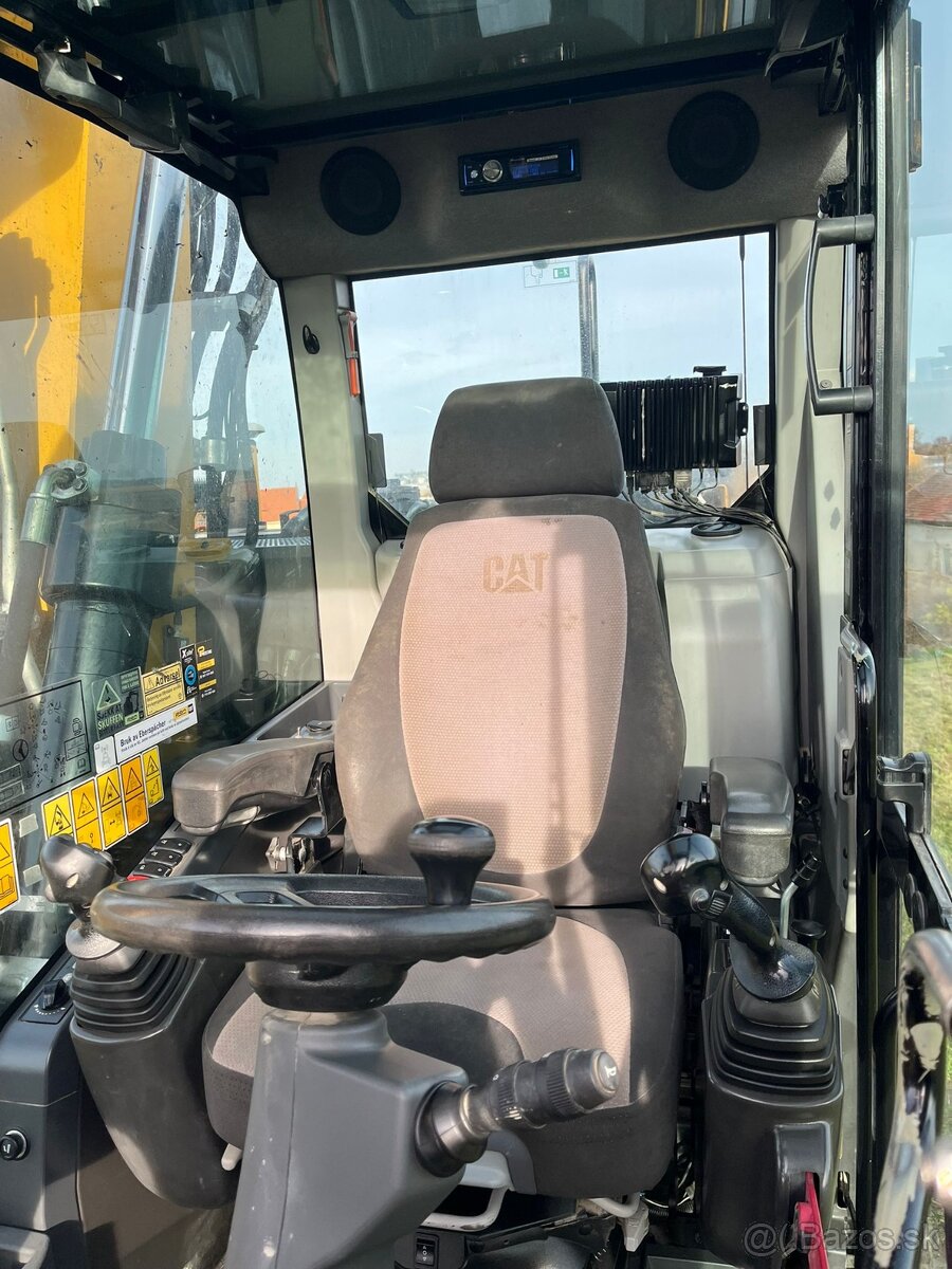 Kolesové rypadlo Caterpillar M316F - 7