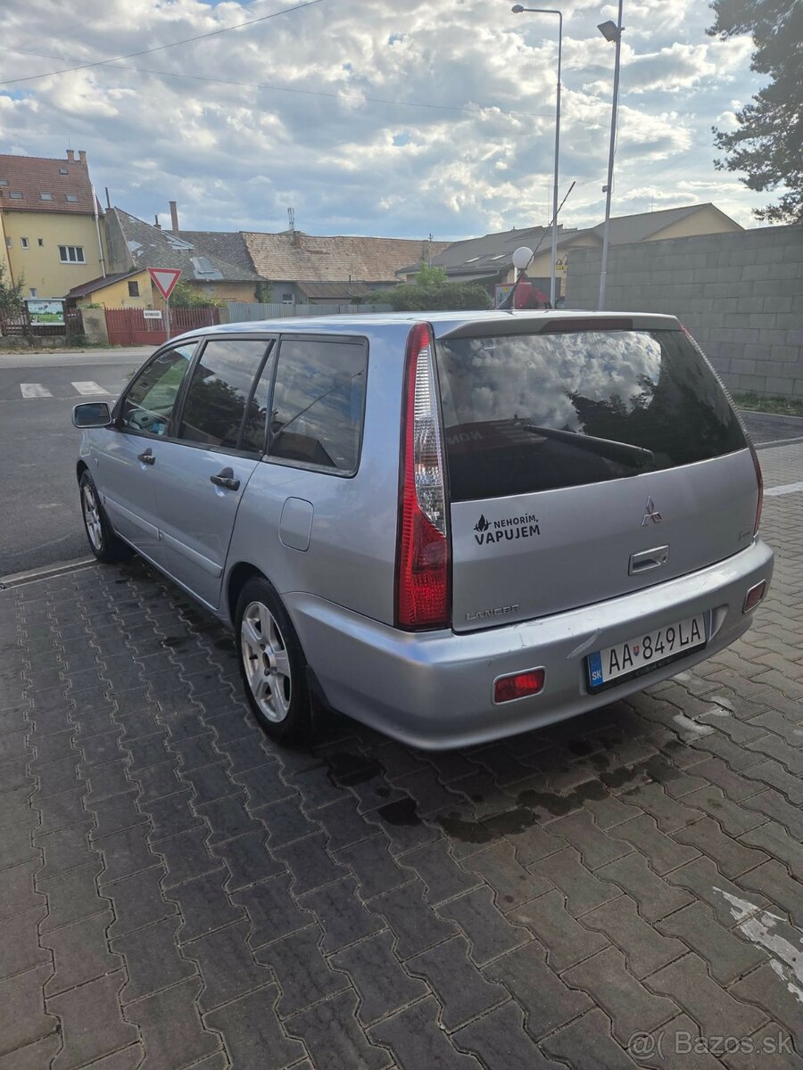 Predám mitsubishi lancer - 7