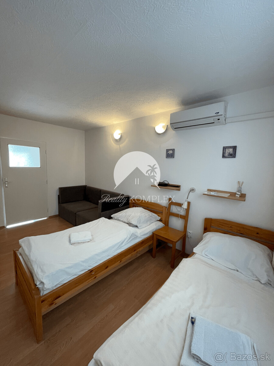 Reality KOMPLEX s.r.o. Vám ponúka apartmánový dom vo Veľkom - 7