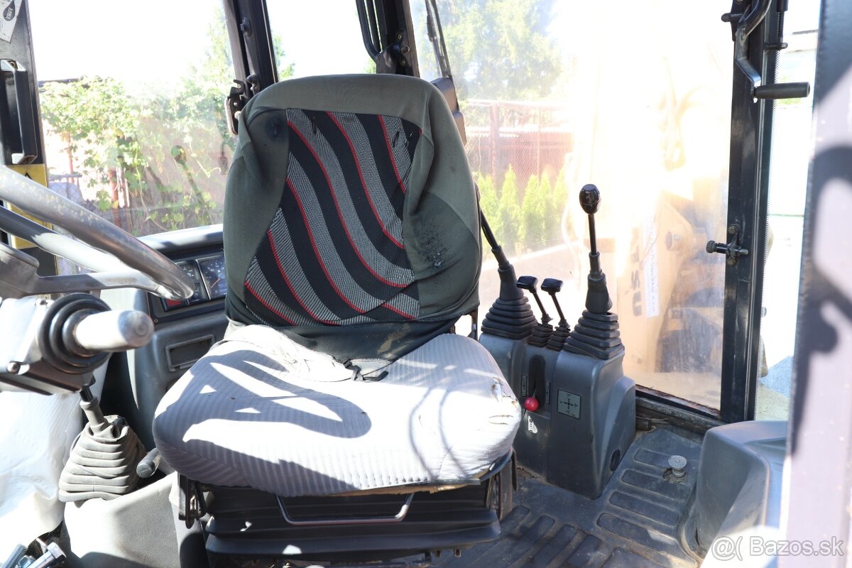 Báger KOMATSU WB97R - 7