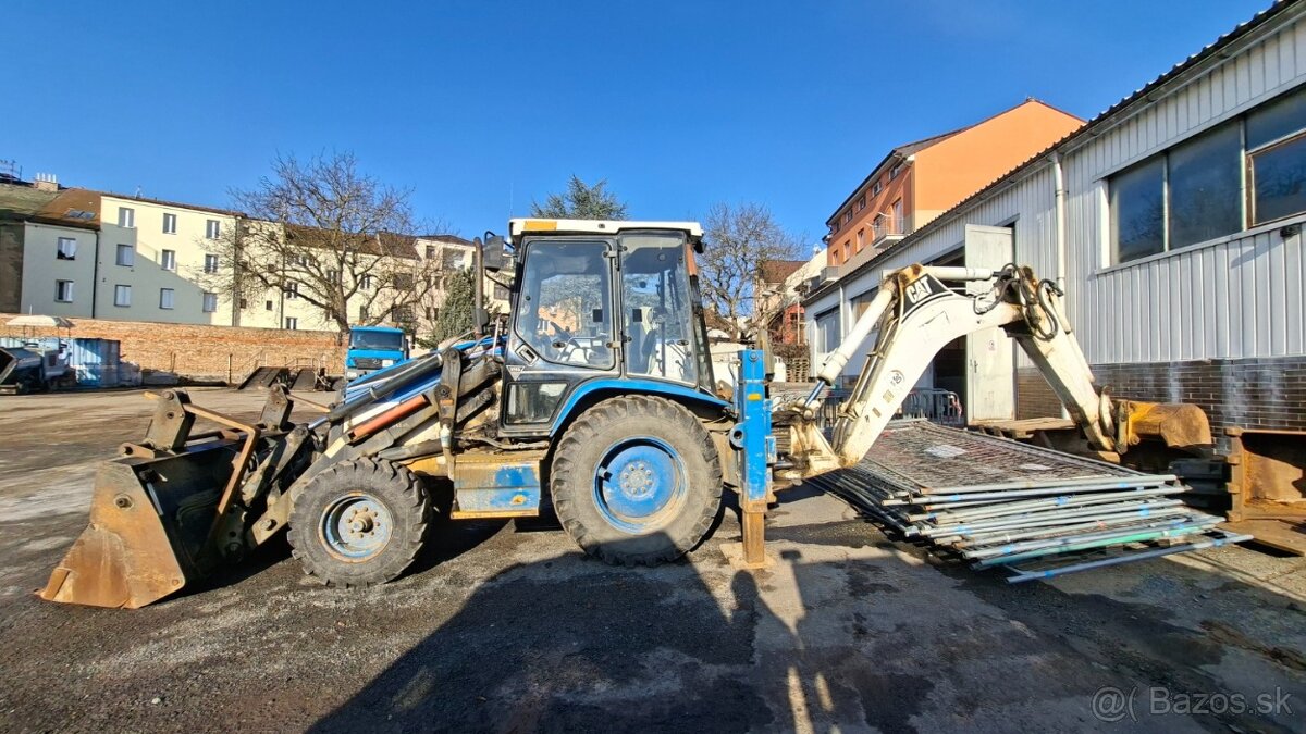 CATERPILLAR 428 C 4X4 - 7